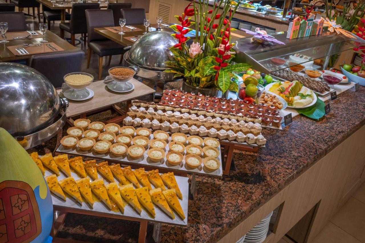 Serhs Natal Grand Hotel & Resort Екстериор снимка A buffet at a hotel